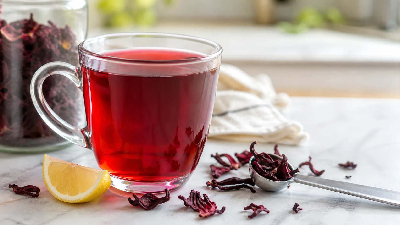 Keto food: hibiscus tea in a glass with dried flowers