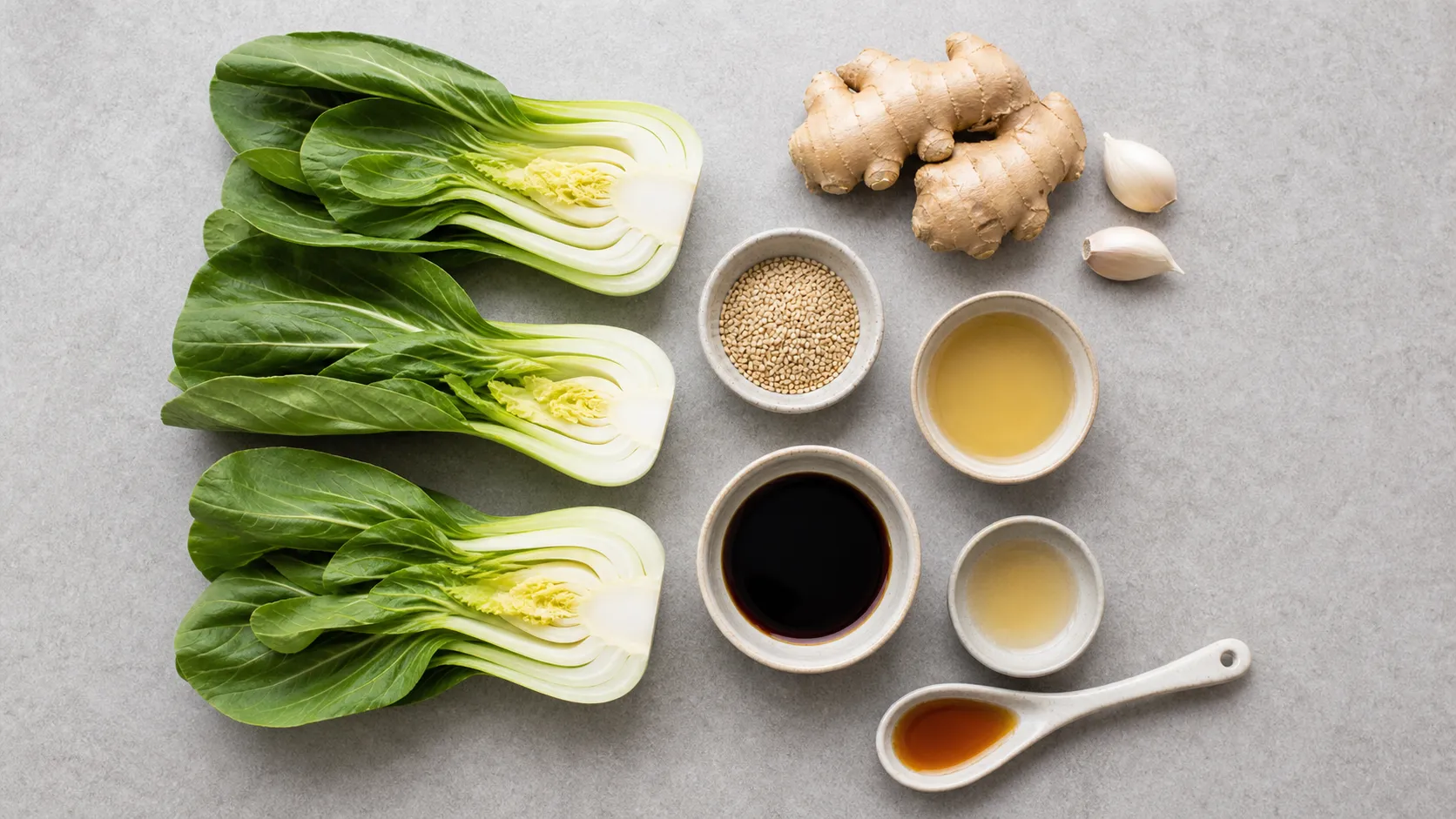 Ingredients for bok choy with sesame and ginger: bok choy, ginger, garlic, sesame seeds, tamari, rice vinegar and sesame oil